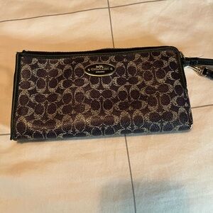 Coach Signature  and deep purple Wristlet